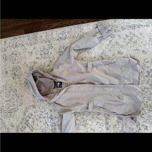 Beige Hooded north face Raincoat